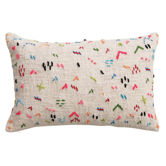 Colorful hand embroidered cotton lumbar pillow with multicolor stitching on natural cream fabric
