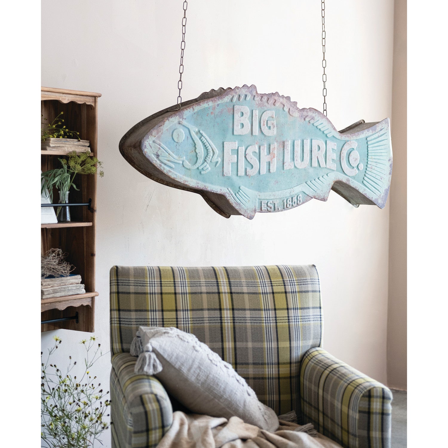 Big Fish Lure Co vintage metal fish wall sign hanging in rustic lake house decor