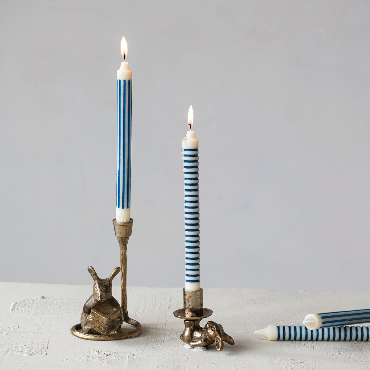 Antique gold cast aluminum reading mouse taper candle holder with book
