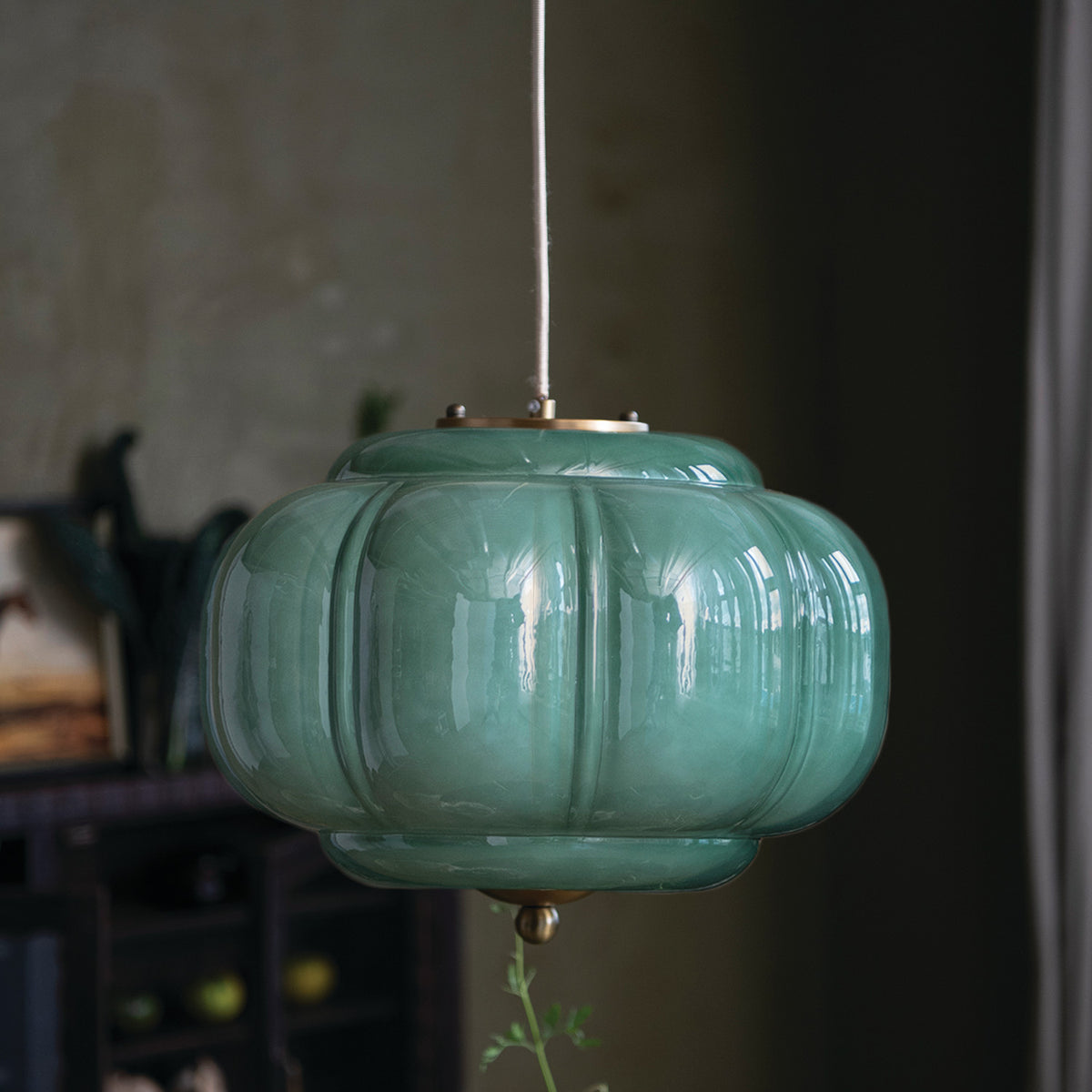 Emerald green glass pendant light styled as vintage kitchen and dining room lighting