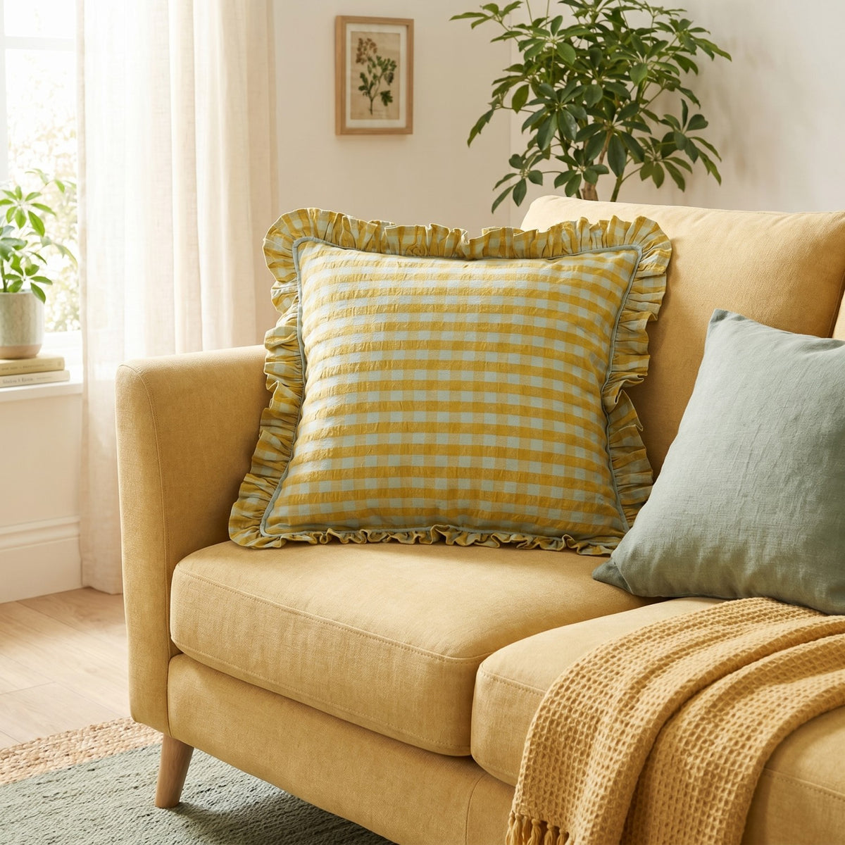 Mustard yellow and soft blue gingham cotton accent pillow with ruffled border
