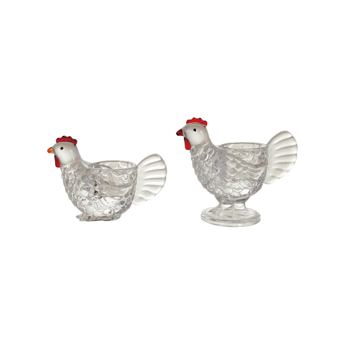 Small and large clear glass chicken votive holders with red combs
