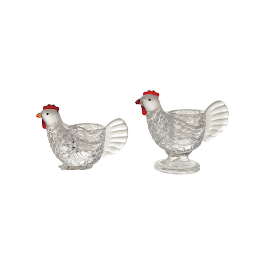 Small and large clear glass chicken votive holders with red combs
