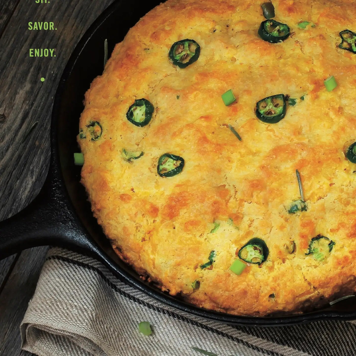Homemade jalapeño cornbread baked in a cast iron skillet