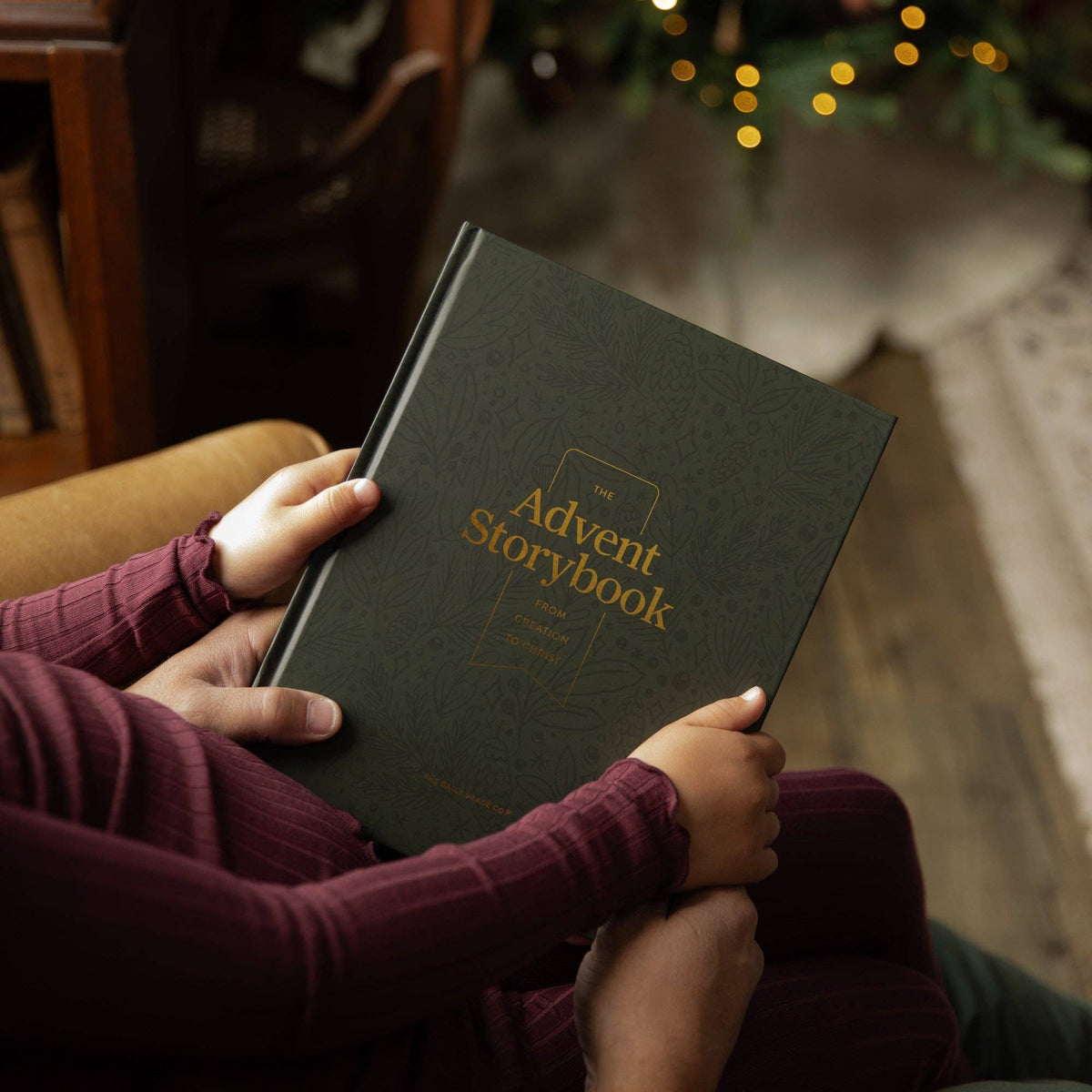 The Advent Storybook From Creation to Christ by The Daily Grace Co, green hardcover Christian Christmas devotional book for families and children.