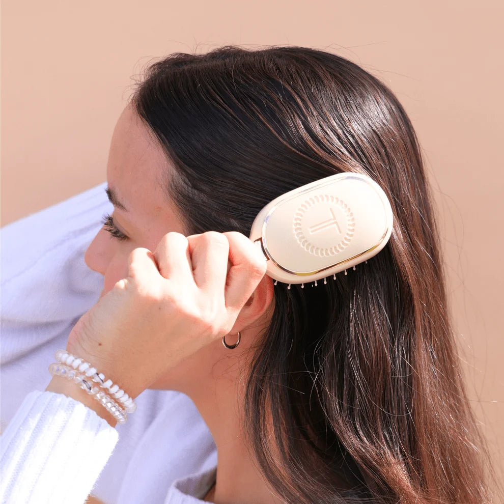 TELETIES Mini Boar Bristle Hair Brush in Tan smoothing and adding shine to brunette hair