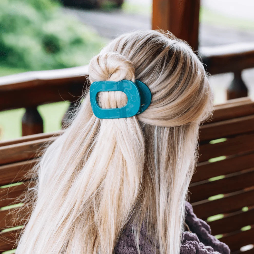 TELETIES teal flat back hair clip styled in blonde hair half up hairstyle